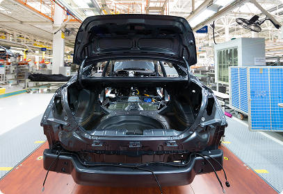 Performance vehicle undergoing a custom high-performance build in a professional automotive workshop